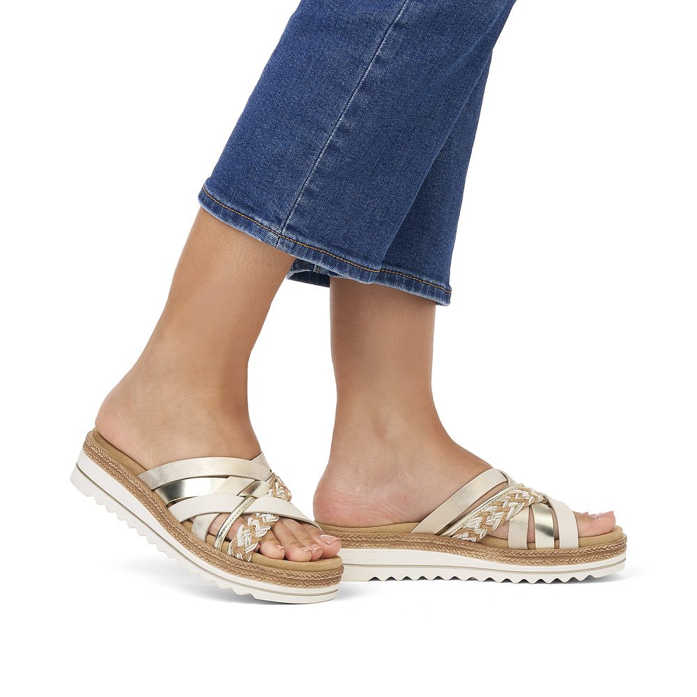 Metallic vegan remonte women´s mules D0Q50-90 with a soft exchangeable footbed. Shoe on foot.