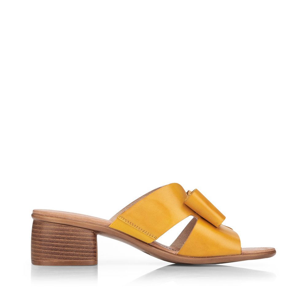 Yellow remonte women´s mules R8759-68 with feminine bow. Shoe inside.