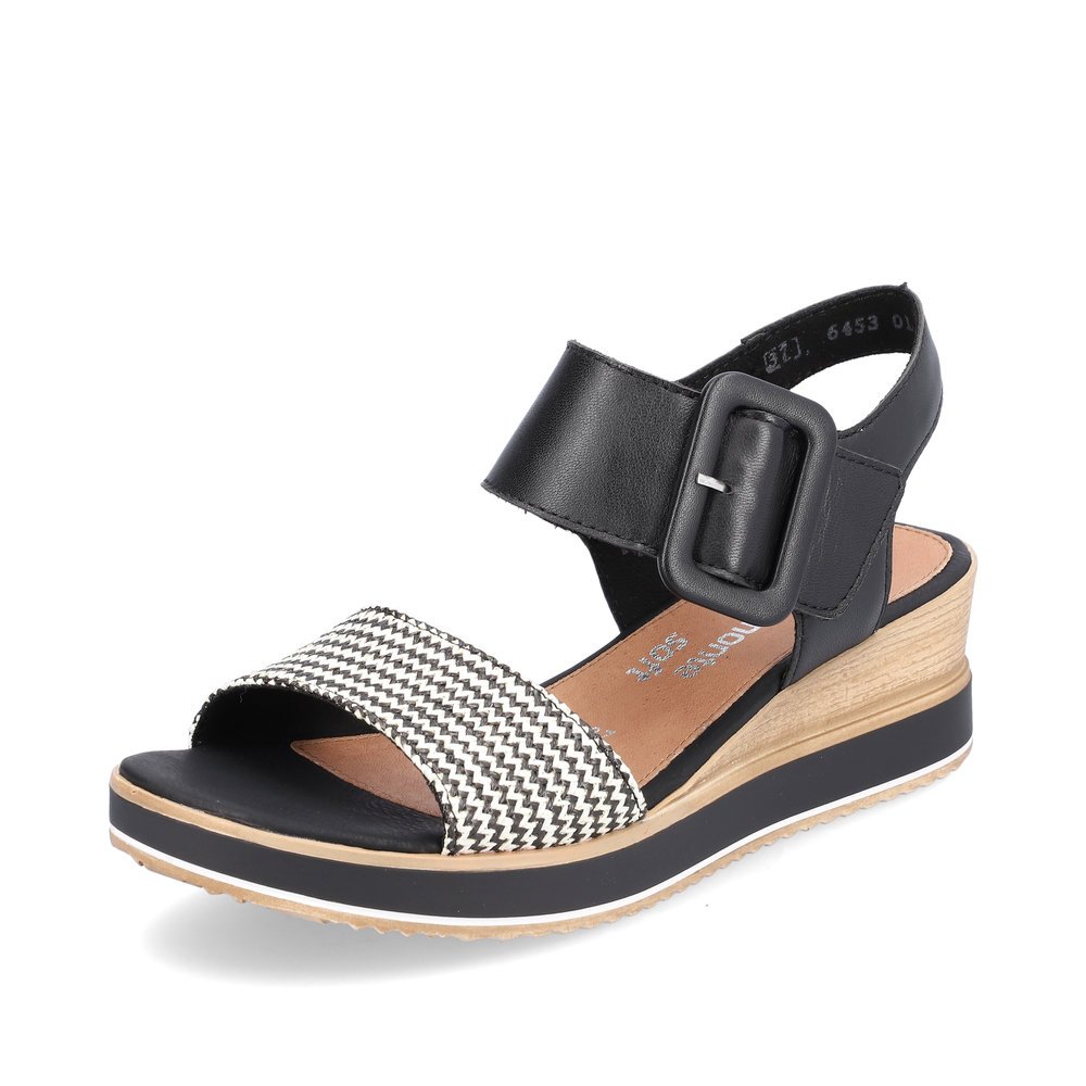 remonte sandales compensées noires femmes D6453-01 avec fermeture velcro. Chaussure inclinée sur le côté.
