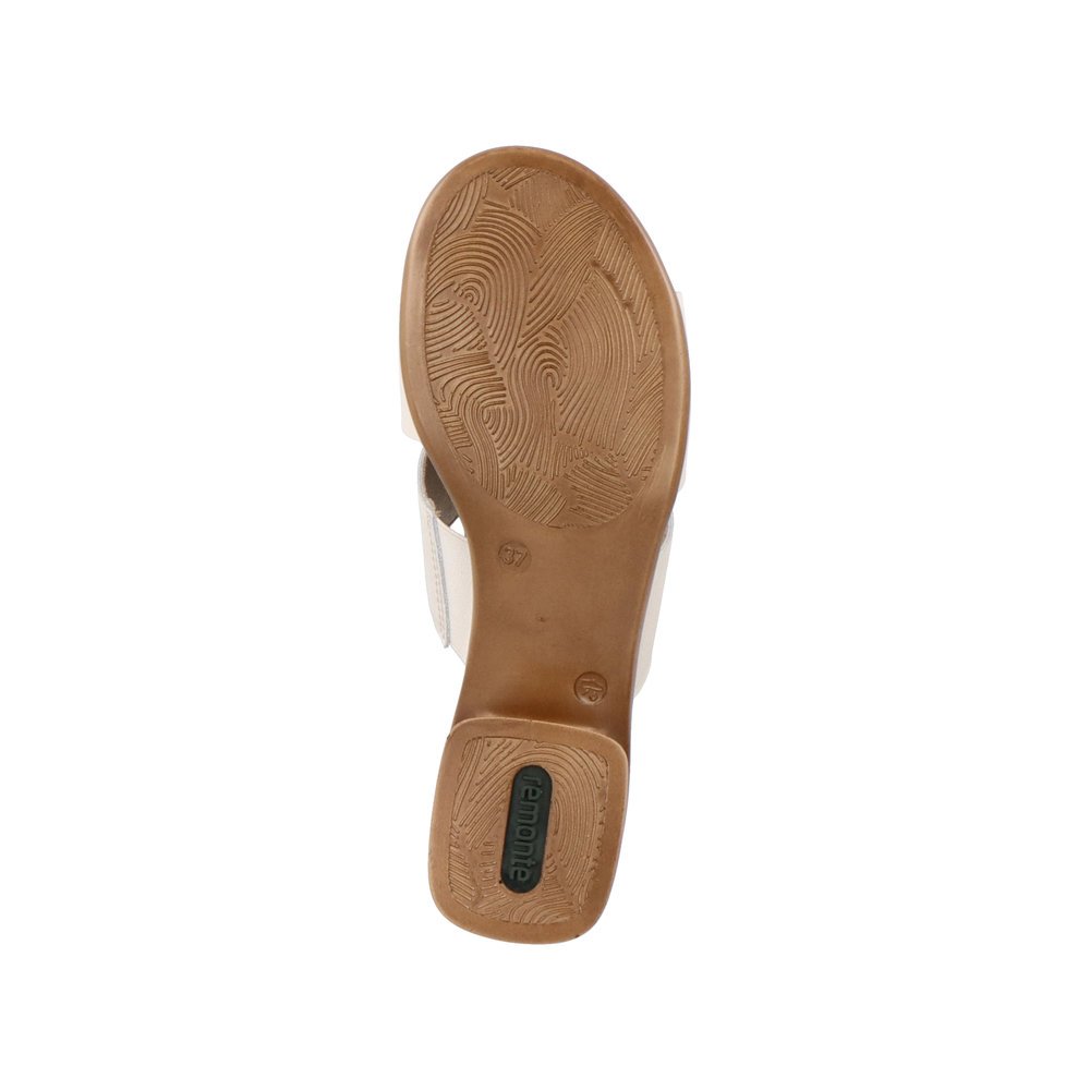 Beige remonte women´s mules R8759-60 with feminine bow. Outsole of the shoe.